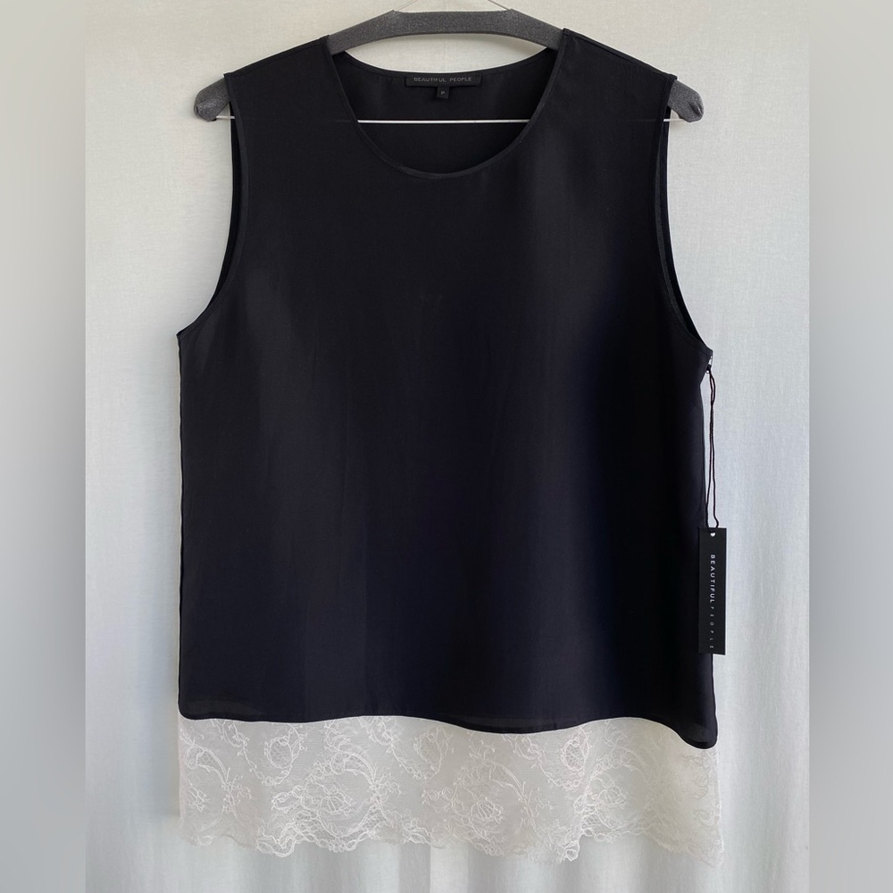 Black natural silk top with a white lace detail at the bottom